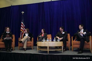 Addressing attendees in December are (l-r) Bev Godwin, director of new media and citizen engagement, U.S. General Services Administration; Cammie Croft, director of new media and citizen engagement, Department of Energy; Amanda Eamich, director of web communications, Department of Agriculture; Charles J. Holt, senior strategist for emerging media, Defense Department; and Sanjay Koyani, director for web communications, Food and Drug Administration.